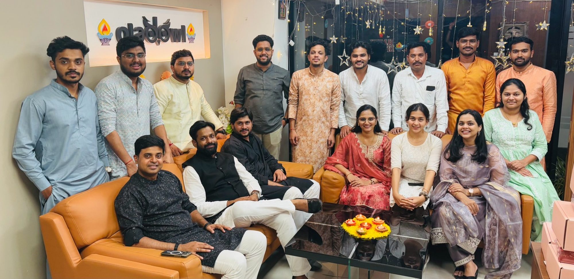 The team dressed in traditional wear for a festive day